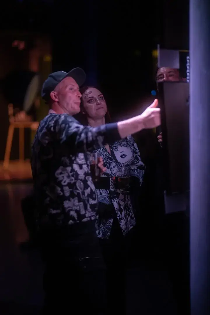 A guest interacting with a work